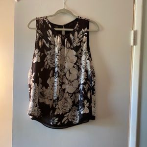 This is a reversible top from White House Black Market